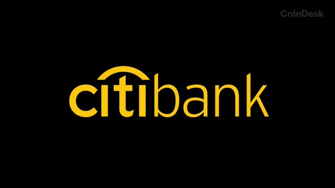 The image features a black background with white lettering that reads "CITIBANK". The text is written in yellow, giving the logo an eye-catching and bold appearance. Below this logo, there's another text that reads "Gold" followed by a dollar sign, implying that CITIBANK is seeking financial investors for its fund of gold investment opportunities. The image also mentions that CITIBANK is investing in gold through 2026, indicating the fund is currently at $17B and has not paid any of its holders a cent until now.