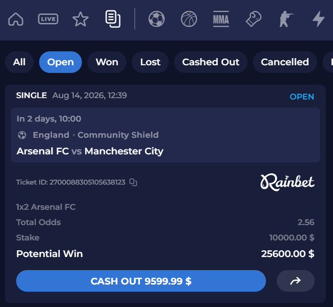 The image shows a Rainbet sports betting slip for an upcoming Arsenal FC vs Manchester City Community Shield match, with a $10,000 stake at 2.56 odds offering a potential win of $25,600 or a cash-out option of $9,599.99. This relates to the post by prompting users to predict the correct full-time score of the Francenal vs Stockport FC match for a chance to win a USDT airdrop, likely as part of a betting community giveaway tied to the platform.