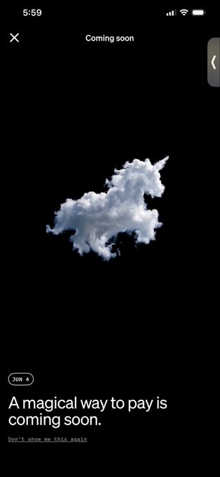 The image features a black background with a white cloud-like shape, which appears to be an unicorn floating above a text box that reads "A magical way to pay is coming soon". The image also includes a small watermark at the bottom of the photo, and there are two thumbs up icons in the top right corner.