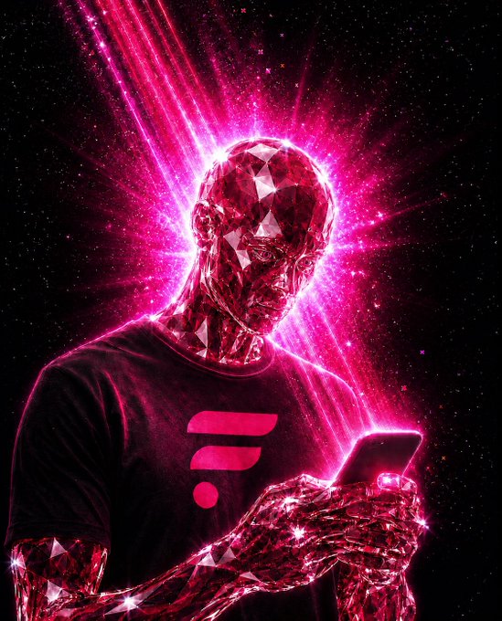A stylized digital artwork of a crystalline humanoid figure made of red gems holding a smartphone, wearing a dark t-shirt with a logo, glowing with intense pink and magenta light against a dark starry background.