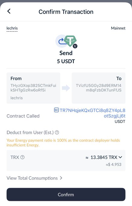 The image shows a phone screen displaying a transaction form for transferring 5 USDT from one account to another. The text on the screen indicates that the user has paid 5 USDT fees, which are being transferred to an offshore account. The transfer is currently in progress and will be completed soon.