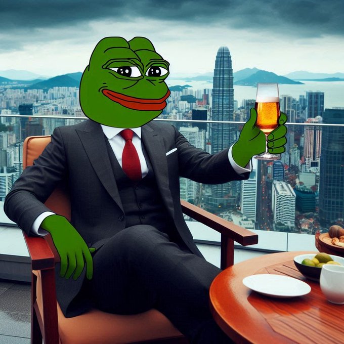 A digitally edited image of the 'Smug Pepe' frog character wearing a black suit and red tie, holding a glass of beer while sitting in a chair overlooking the Hong Kong skyline.