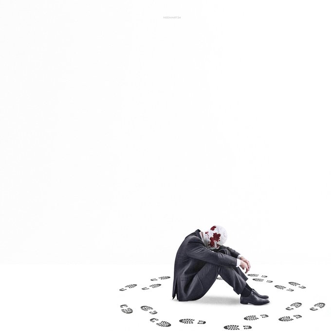 A solitary figure in a dark suit sits huddled against an expanse of white space, surrounded by scattered black footprints, with red stains visible near their head.