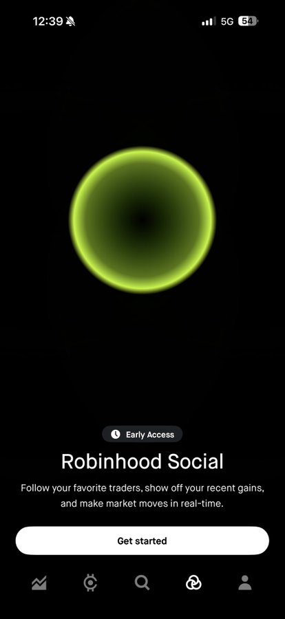 The image shows a phone screen displaying an app called "Early Access Robinhood Social". The app has a green background with a white circle, which appears to be a logo or icon for the app. On the right side of the screen, there is a message that reads "Get Started" and "Follow your favorite traders." This suggests that users can easily access the app's features and benefits by following the provided instructions. The image also includes a small amount of text in the bottom left corner, which could be related to the app or its purpose.