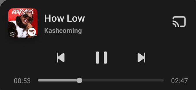 The image shows a music streaming app with a black background, displaying the song "How Low Can You Go?" by Kashoomg. The app has a red and white design, and there are two play buttons labeled "P" and "S". The time displayed on the screen is approximately 00:53:47.
