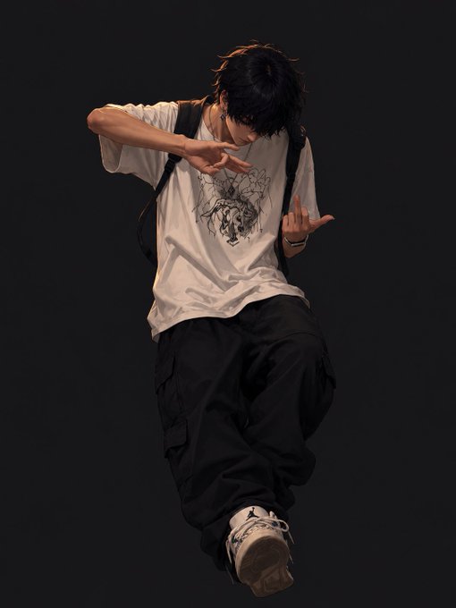 A person wearing a white graphic t-shirt, black cargo pants, and sneakers posing mid-jump with hand signs against a black background.