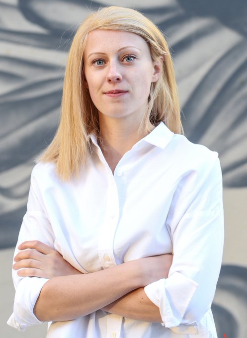 A portrait shows Jasmine Cooper, Head of Product for RippleX, standing with her arms crossed in a white shirt against a gray patterned background. It accompanies her quoted comments at #Ripple about XRPL and RLUSD supporting fast cross-border settlement liquidity.