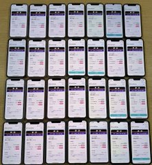 A photo shows dozens of smartphones arranged in a grid, all displaying similar sports betting or lottery app interfaces with rows of red odds.