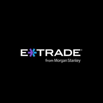 The image displays the E*TRADE logo with the tagline "from Morgan Stanley" on a black background. The logo relates to the news as it represents the E*TRADE platform, now under Morgan Stanley, which is rolling out Bitcoin spot trading to its 8.6 million clients.