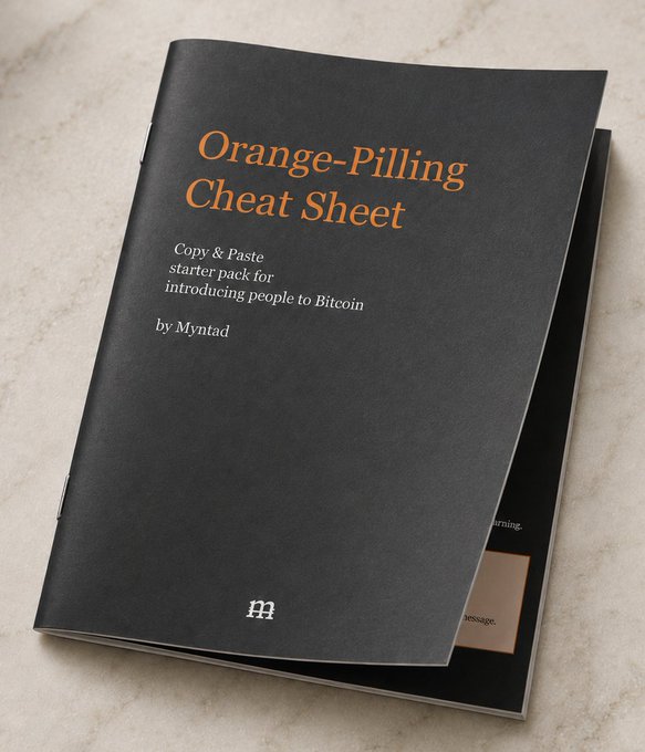 A sleek black booklet titled "Orange-Pilling Cheat Sheet" by Myntad rests on a marble surface, offering a "Copy & Paste starter pack for introducing people to Bitcoin." The image directly supports the post's promotion of a free, curated 7-resource guide designed to help users easily introduce others to Bitcoin.