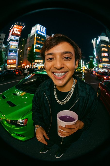 A fisheye-lens portrait of a smiling person in a black jacket and silver chain holding a purple slushie, standing in front of a green sports car and a vibrant nighttime city street, possibly in Tokyo.
