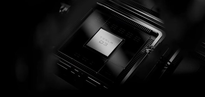 The image features a close-up view of a computer chip, specifically a D3 chip from TerraFab Project. The chip is black with silver lines running across its surface, giving it an industrial appearance. The background of the image is dark gray, which contrasts with the chip and makes it stand out more prominently. The text "TerraFab Project" can be seen in the image, indicating that this is a product or project from TerraFab.