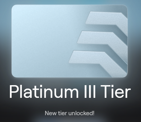 A notification card displays a silver tier badge with 'Platinum III Tier' and 'New tier unlocked!' on a dark background.