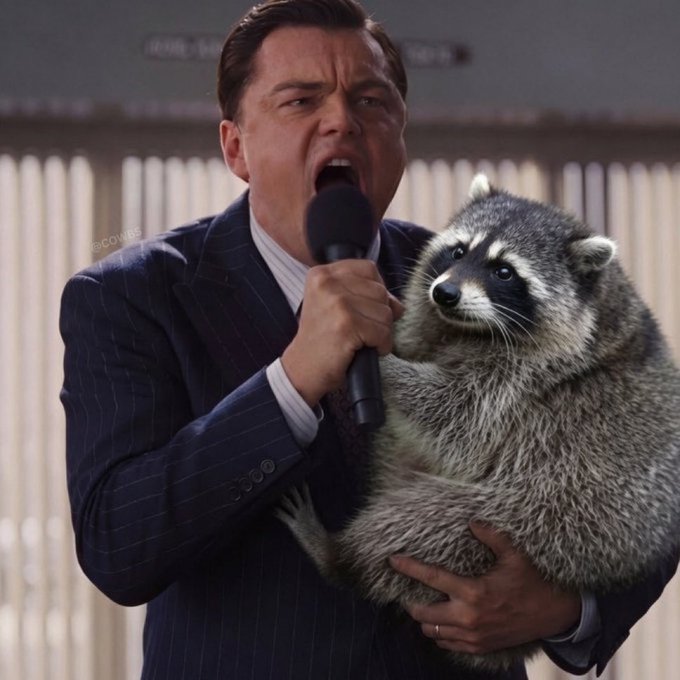 A man in a pinstripe suit passionately speaks into a microphone while cradling a raccoon, fitting the $JIMOTHY COONERS meme theme of comedic "raccoon roll call."