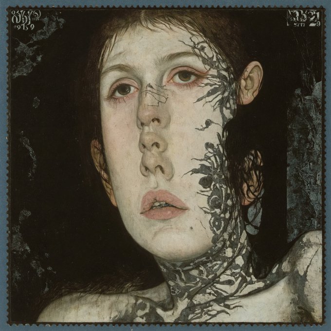 A surreal portrait depicts a woman with detailed tattoos covering one side of her face and neck, presented with a perforated stamp-like border.