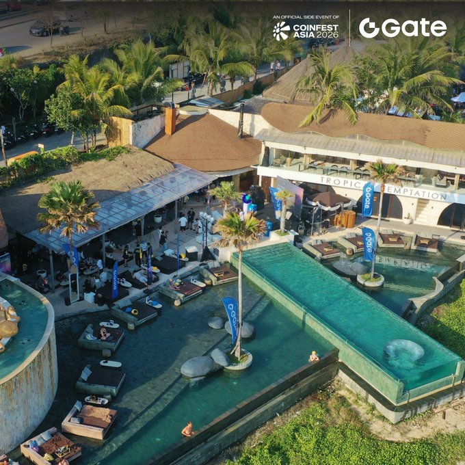 Aerial view of a tropical resort venue with a pool area, thatched-roof structures, and palm trees, branded as an official side event of 'COINFEST ASIA 2026' with the 'Gate' logo in the top right corner.