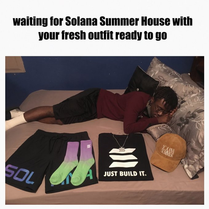 A meme captioned 'waiting for Solana Summer House with your fresh outfit ready to go' shows a man lying on a bed next to Solana-branded merchandise, including shorts, socks, a 'JUST BUILD IT' t-shirt, and a 'SOLANA SUMMER' cap.