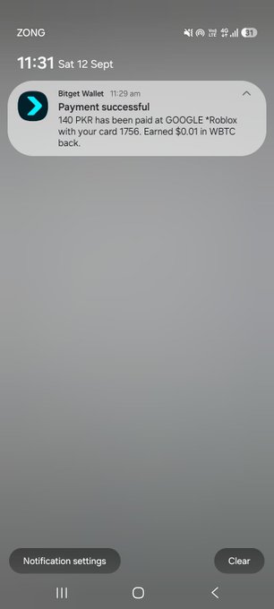 Phone notification screenshot from Bitget Wallet showing 'Payment successful - 140 PKR has been paid at GOOGLE *Roblox with your card 1756. Earned $0.01 in WBTC back.' on a ZONG network at 11:31 Sat 12 Sept.