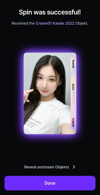 A mobile app screen displaying a successful spin result, showing a photo card of 'Cream01 Kaede 2022Z' with a 'Done' button.