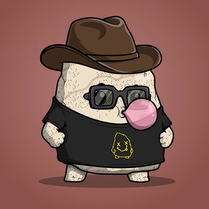 A cartoon character bubble wearing a brown cowboy hat, sunglasses, and a black t-shirt with a yellow X-eyed figure, blowing a pink bubblegum bubble. The image complements the post's note about bubble traits, showcasing a stylized "bubble" character as a fun visual representation of the trait being discussed.