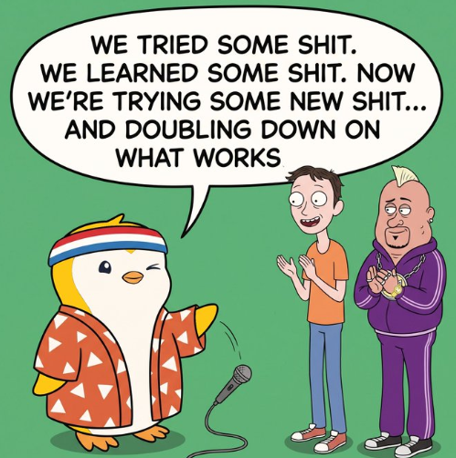A cartoon featuring a penguin-like character in a red patterned robe speaking into a microphone with a speech bubble reading 'WE TRIED SOME SHIT. WE LEARNED SOME SHIT. NOW WE'RE TRYING SOME NEW SHIT... AND DOUBLING DOWN ON WHAT WORKS', while two other cartoon characters applaud.
