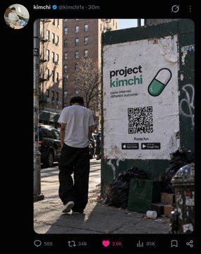 Instagram-style post by "kimchi @kimchi.tv - 30m" showing a street scene with a person walking beside a wall poster reading "project kimchi" with a QR code.