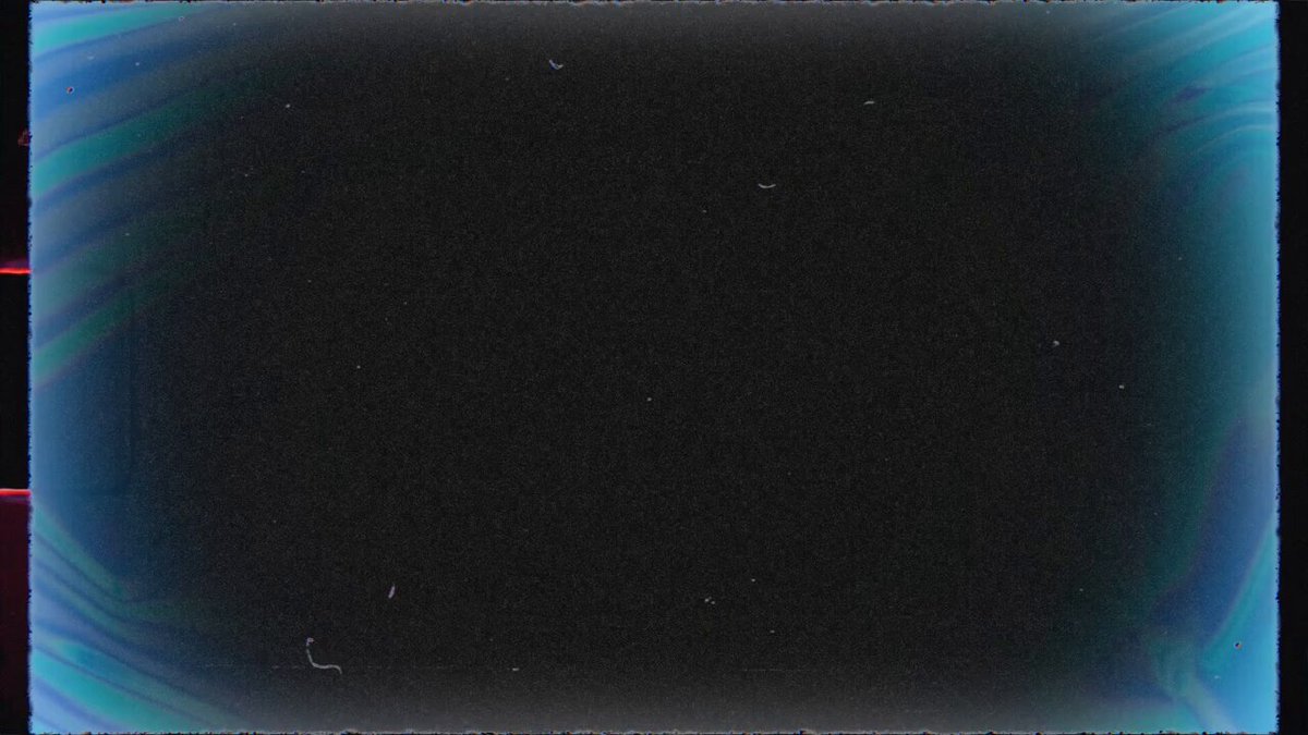The image shows a square frame with a black background that has been edited or altered to appear as if there are blue and purple colors instead of the typical black. The frame appears to be a part of a larger project, possibly related to the release of a documentary on El Salvador by Hardisk.