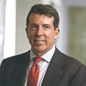 A professional headshot of Bob Diamond, former Barclays CEO, smiling and wearing a dark suit with a white shirt and red patterned tie. The image accompanies a news update in which Diamond names Circle and Hyperliquid as expected winners under the new CLARITY Act framework.