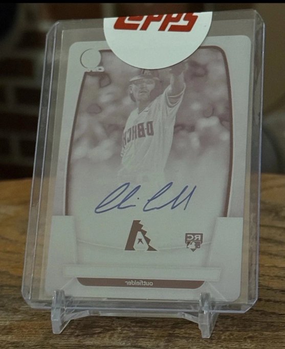A Topps autographed baseball card featuring Alan Craig of the San Diego Padres, encased in a plastic holder.