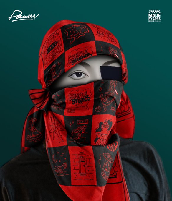 An artistic portrait of a person wearing a red and black checkered balaclava covered in doodles, including the text 'BEEPLE STUDIOS', 'STYLE', and 'TOOLS', with a 'MADE BY APES' logo in the corner.