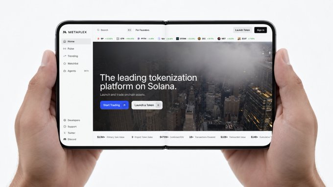 Two hands hold an unfolded smartphone displaying the 'METAPLEX' website, advertised as 'The leading tokenization platform on Solana.'