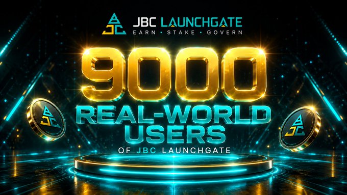 A celebratory promotional graphic for $JBC LaunchGate featuring the headline "9000 REAL-WORLD USERS OF JBC LAUNCHGATE" in bold gold and teal text, flanked by two branded coin icons on a futuristic neon-lit stage. The image visually reinforces the post's announcement of surpassing 9,000 real-world users on the Earn • Stake • Govern platform.
