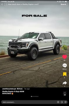 A TikTok video screenshot showing a white Shelby Raptor F-150 truck parked by the ocean, with 'FOR SALE' overlaid and a caption reading 'Shelby Raptor & Baja NOW AVAILABLE'.