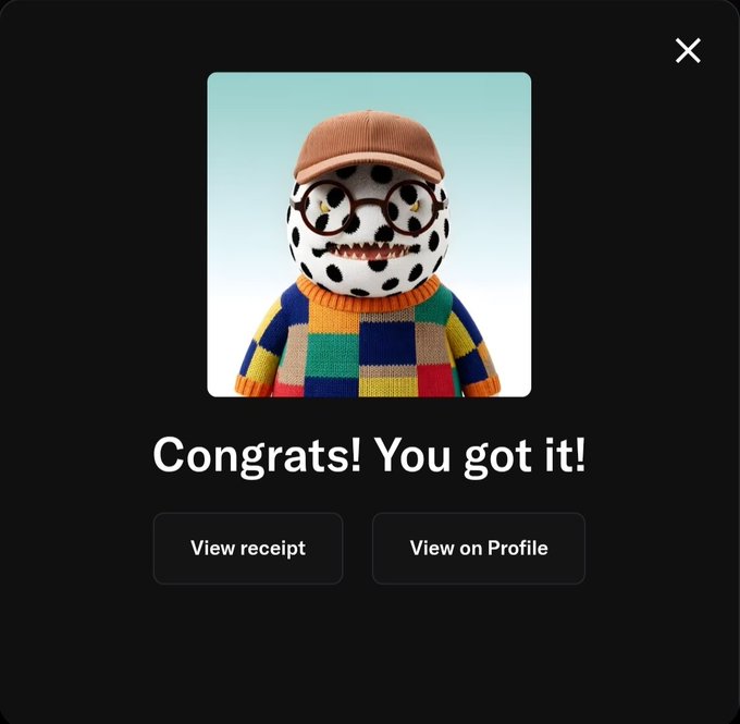The image displays a confirmation popup reading "Congrats! You got it!" with a colorful doll-like character featuring a spotted white face, glasses, and an orange cap, alongside "View receipt" and "View on Profile" buttons. This success notification relates to the post, indicating the user successfully purchased another art piece from @biteclubART while the price was still low.
