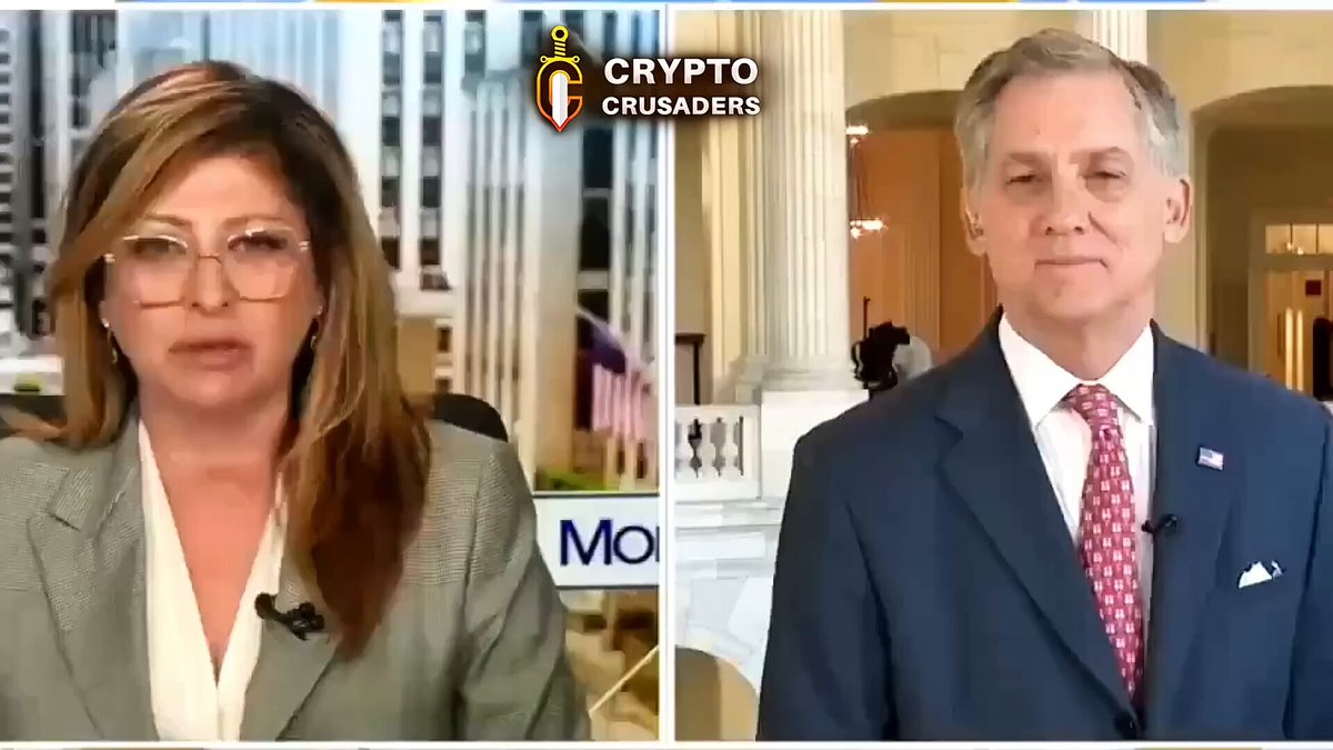 The image shows a news segment featuring two people, one wearing glasses and the other dressed in a suit with a red tie. They are discussing the clarity act that will be beneficial for banks. The background of the image includes a building and an American flag, suggesting that they might be talking about financial matters or regulations related to banking institutions.

The post also mentions Bitcoin and Ripple, which could potentially be related to the discussion between the two individuals in the news segment.