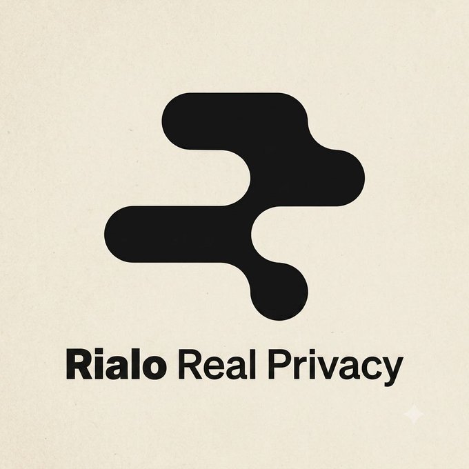 A black stylized logo resembling interconnected rounded shapes on a cream background with the text 'Rialo Real Privacy'.