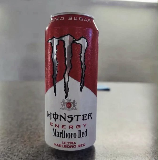 A red and white Monster Energy drink can labeled 'Marlboro Red Ultra' variant, featuring the iconic Monster claw logo and 'ZERO SUGAR' text near the top, sitting on a speckled countertop.