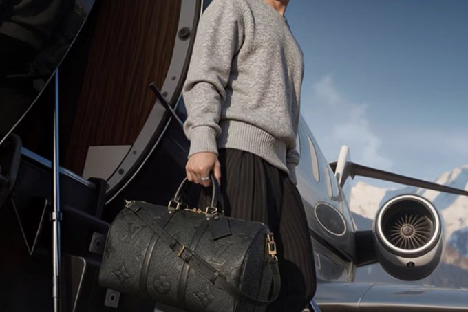 A person in a gray sweater steps off a private jet holding a black Louis Vuitton duffle bag, evoking an image of wealth and luxury. The accompanying post tries to sell this lifestyle by promoting quick crypto gains through the platform "1win," using the imagery of affluence to lure viewers into its scheme.