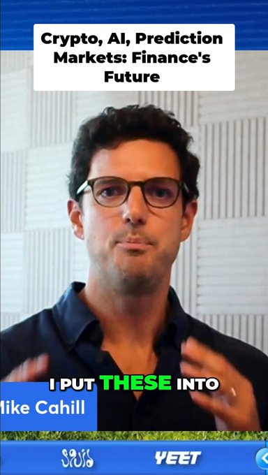 The image features a man wearing glasses, with his hand raised as if giving an explanation or statement. The caption below him reads "I put these into you". This suggests that Mike Cahill has made a statement about Crypt, Al, Prediction Markets' Finance's Future and wants it to be shared by the viewers of this image.