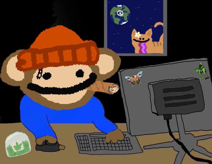 A cartoon illustration depicts a monkey wearing an orange beanie and blue shirt typing at a computer keyboard, with a picture of a dog on the wall above.