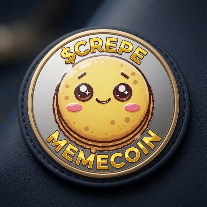 A close-up of a circular pin or badge reading '$CREPE MEMECOIN' with a cute smiling crepe character in the center.