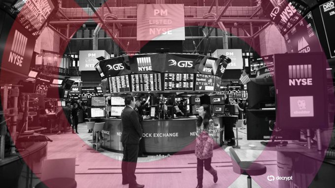 A trading floor scene with a red overlay, showing 'NYSE' signs, 'PM LISTED NYSE', and a 'decrypt' watermark.