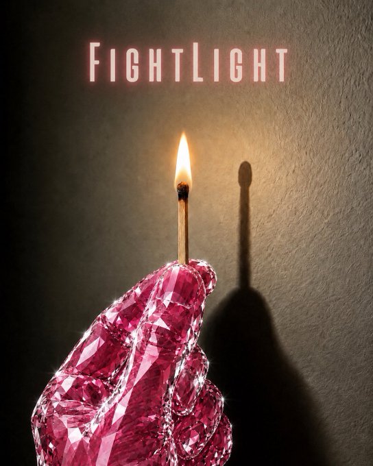 A promotional image showing a hand covered in pink crystals holding a lit match with the text 'FIGHTLIGHT' displayed in red neon-style lettering.