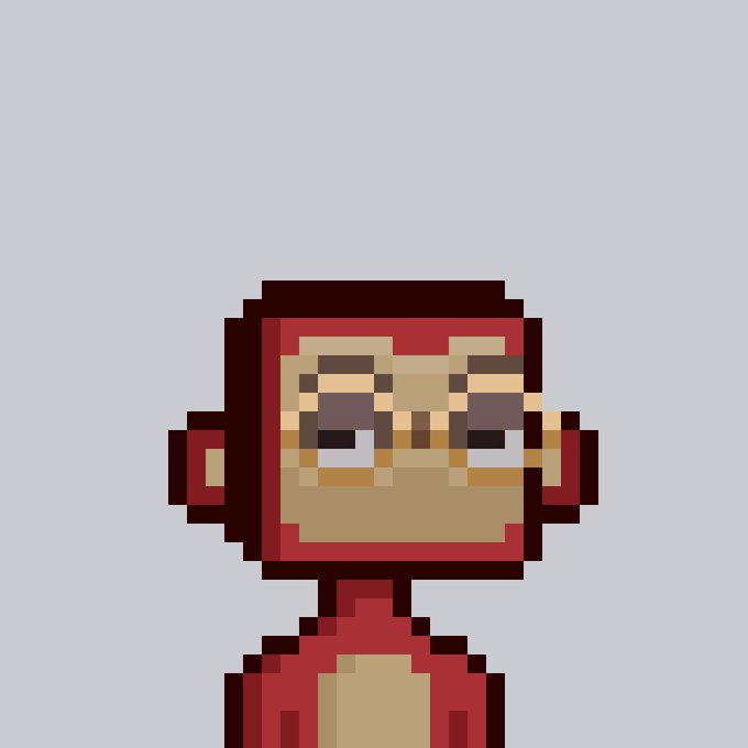 A pixel art illustration of a monkey character with a red face and ears against a gray background.