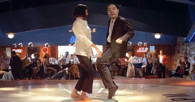 A man photoshopped into the iconic dance scene from Pulp Fiction, mirroring Mia Wallace's moves, visually represents how Litecoin is "lite on its feet" by making a lively connection between the cryptocurrency and the energetic dance. There is text that reads "ICE CREAM" visible in the background.