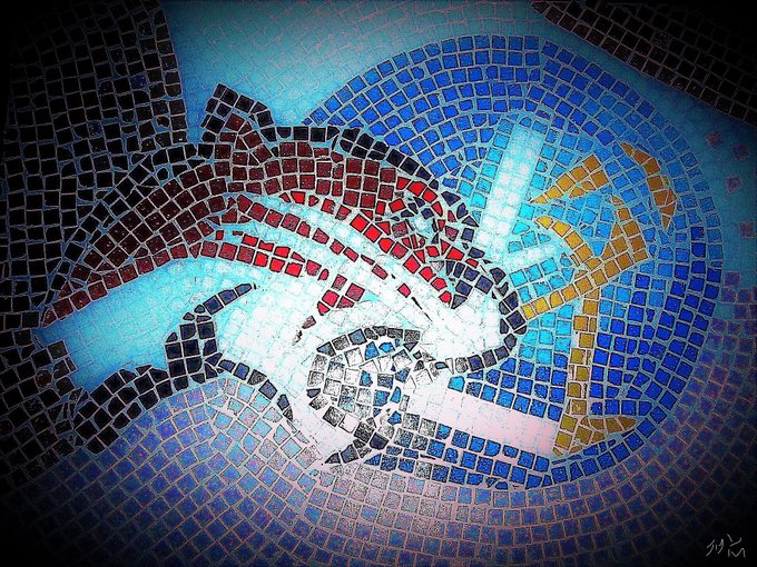 A colorful mosaic artwork depicting a figure, possibly a superhero, rendered in shades of red, blue, white, and gold tiles.