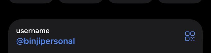 A dark interface screen displaying the text 'username @binjipersonal' in blue with a small icon to the right.