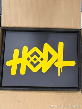 A yellow "HODL" graffiti-style logo is displayed inside a cardboard box, representing Binance's 9th anniversary gift package to a long-term user who received merchandise including a phone charm, silk scarf, jacket, and backpack.