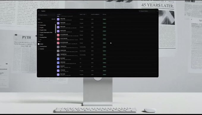 The image shows a computer monitor with a keyboard and mouse placed on top of it, displaying a screen filled with various data and information. The monitor appears to be turned off or in sleep mode at the moment. The background features a wall covered in papers, which could potentially be related to the content displayed on the monitor.