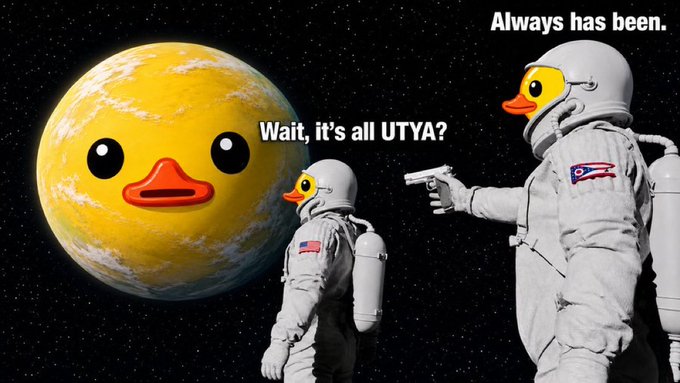 An astronaut points a gun at another astronaut who has discovered the Moon is actually a giant UTYA duck, captioned "Wait, it's all UTYA?" with the reply "Always has been." The meme humorously suggests that UTYA's "duck"-like market presence has always been looming, with the yellow duck planet making it the perfect investment opportunity.
